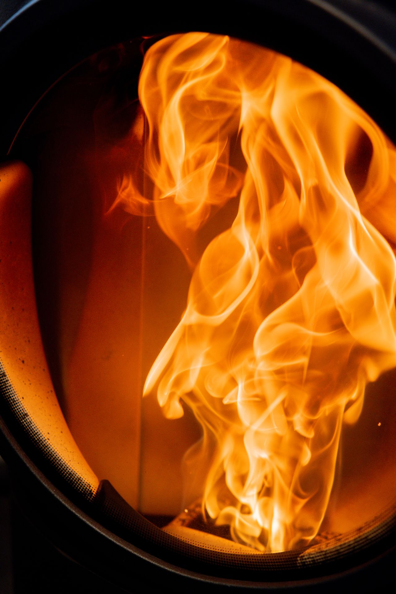 Bright orange flames in a can.
