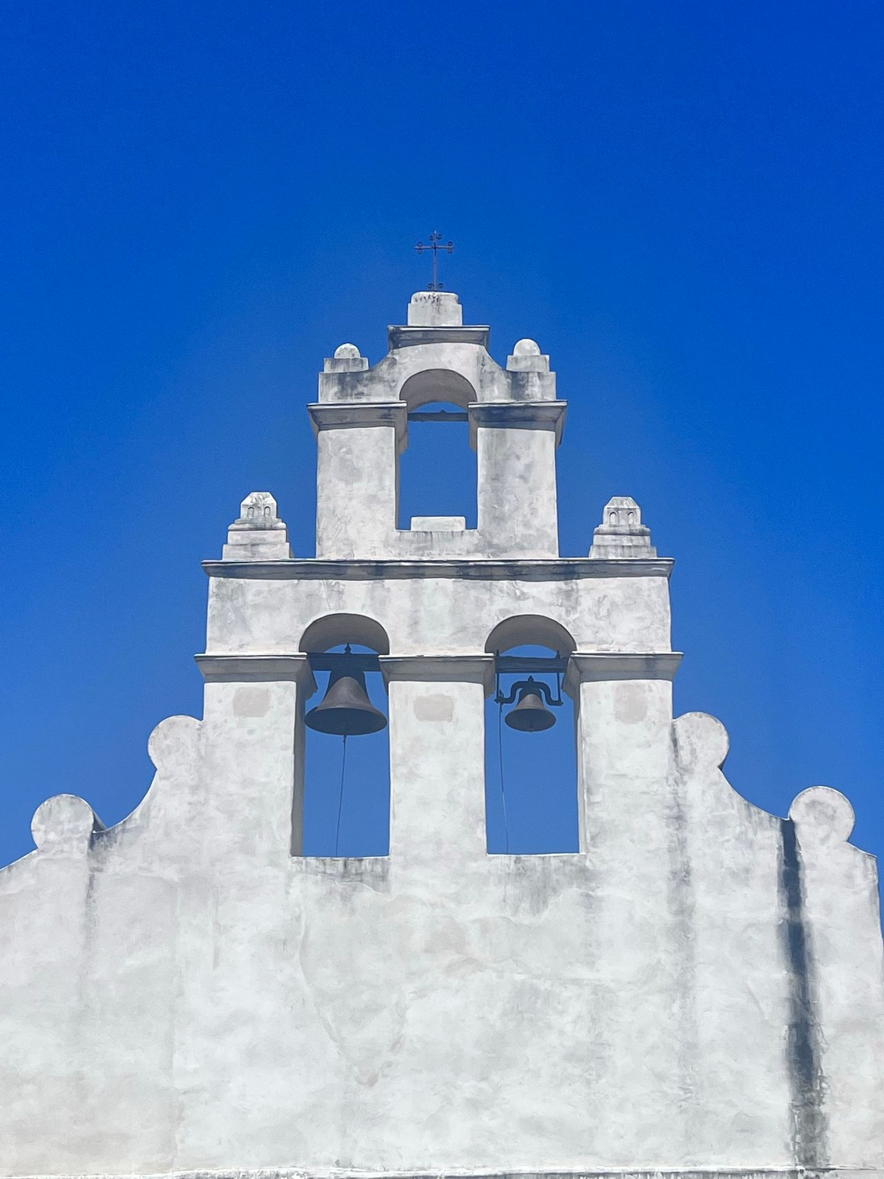 White building with two bells