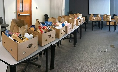 Boxes of food ready for pick up at a food bank